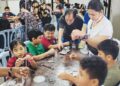 A fun lesson in rosary-making at Mantin parish