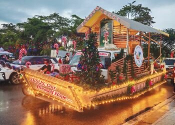 Rain fails to dampen spirit at ACS Sibu Christmas parade