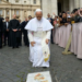 Pope Leo XIV prays at the spot where St John Paul II was shot